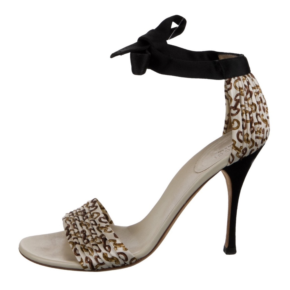 Gucci logo high heel shoe with ankle tie.